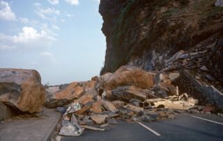 Rock slide on a hilltop road