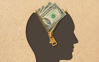 Man head profile with open zipper and dollar banknotes - Concept of thinking about money and financial success